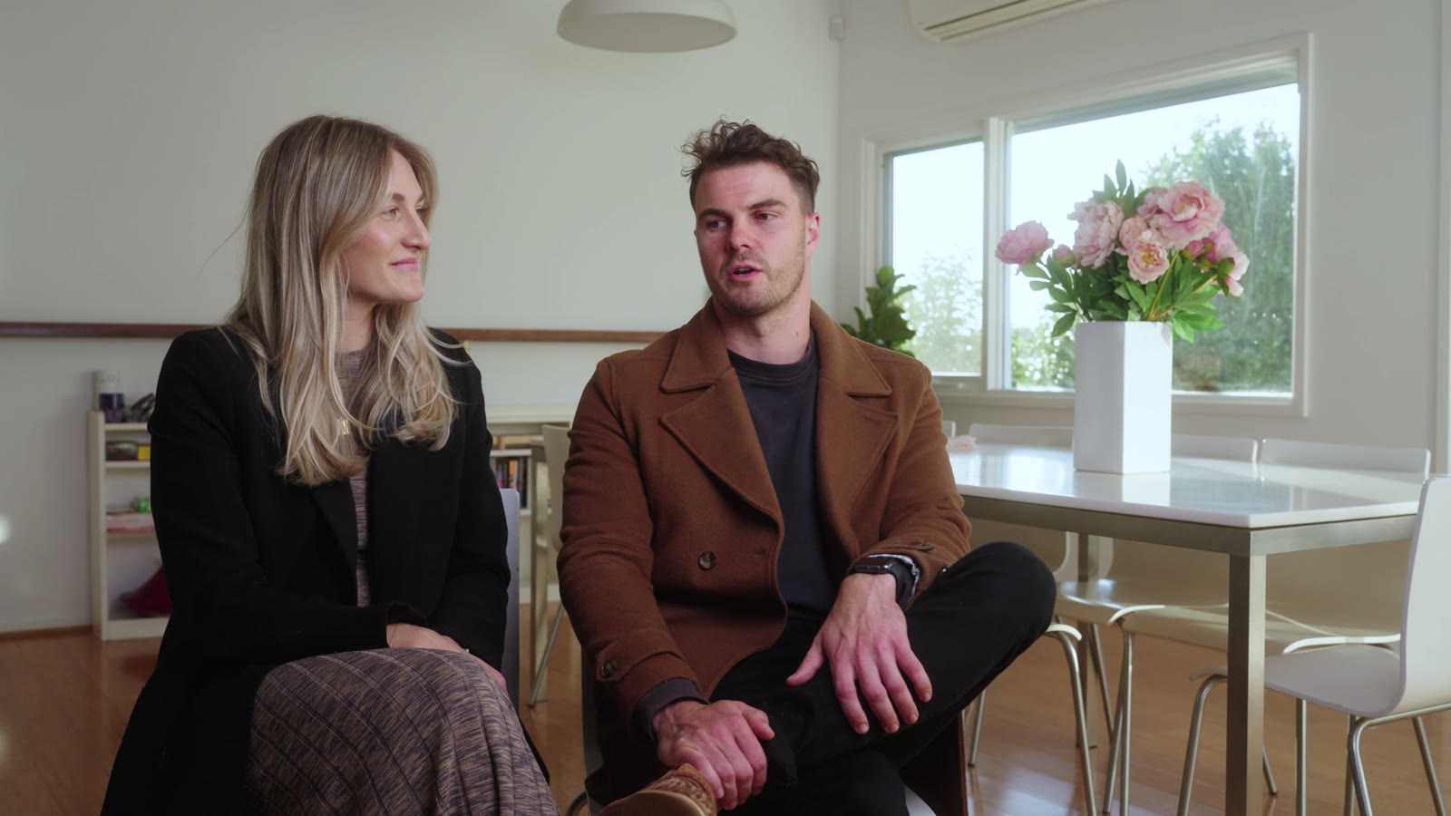 The owners of Dugan Street, Deakin, being interviewed in their home