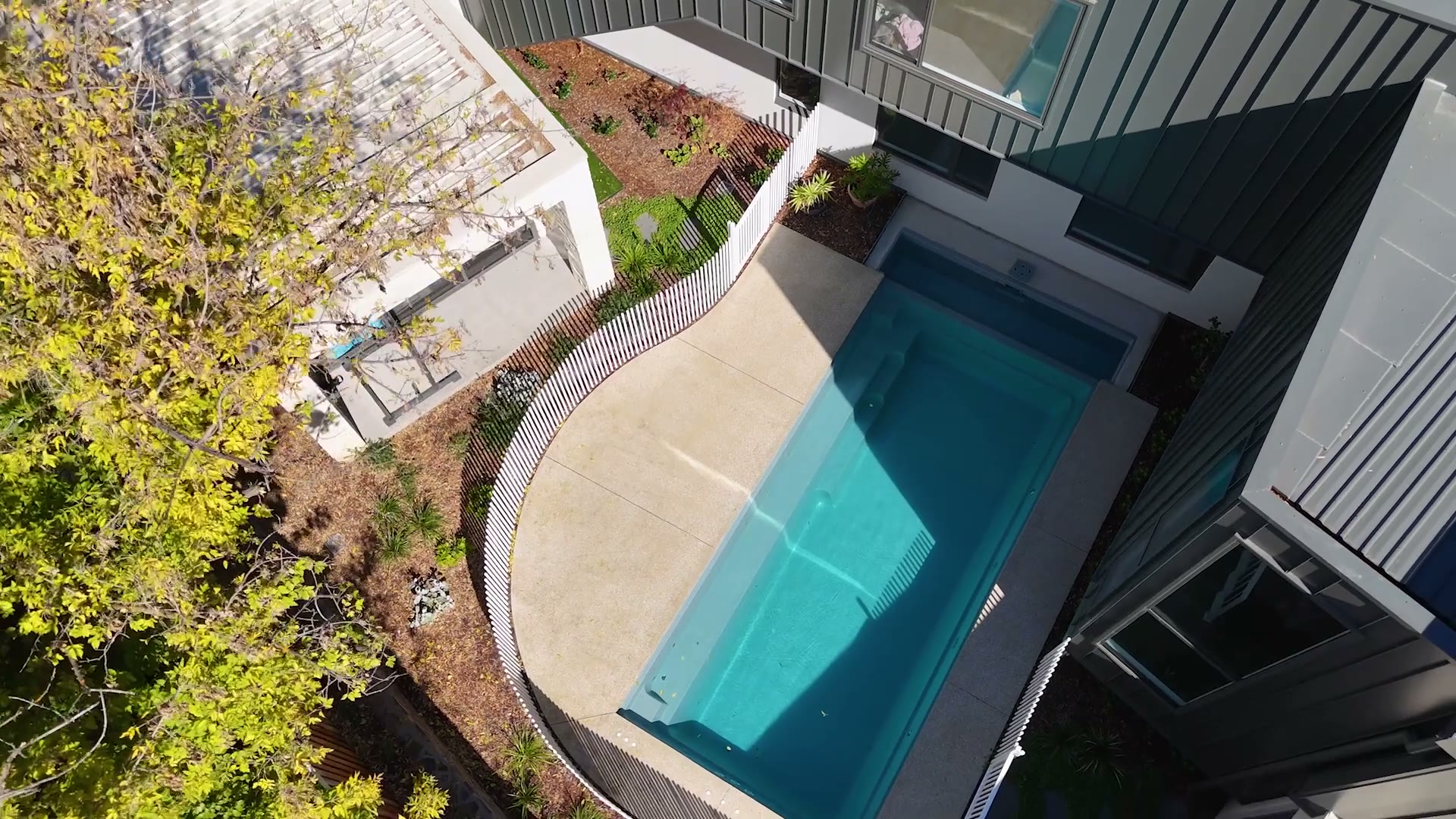 Aerial of the finished Yarralumla home, pool and established garden